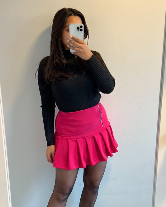 Falda tableada fucsia